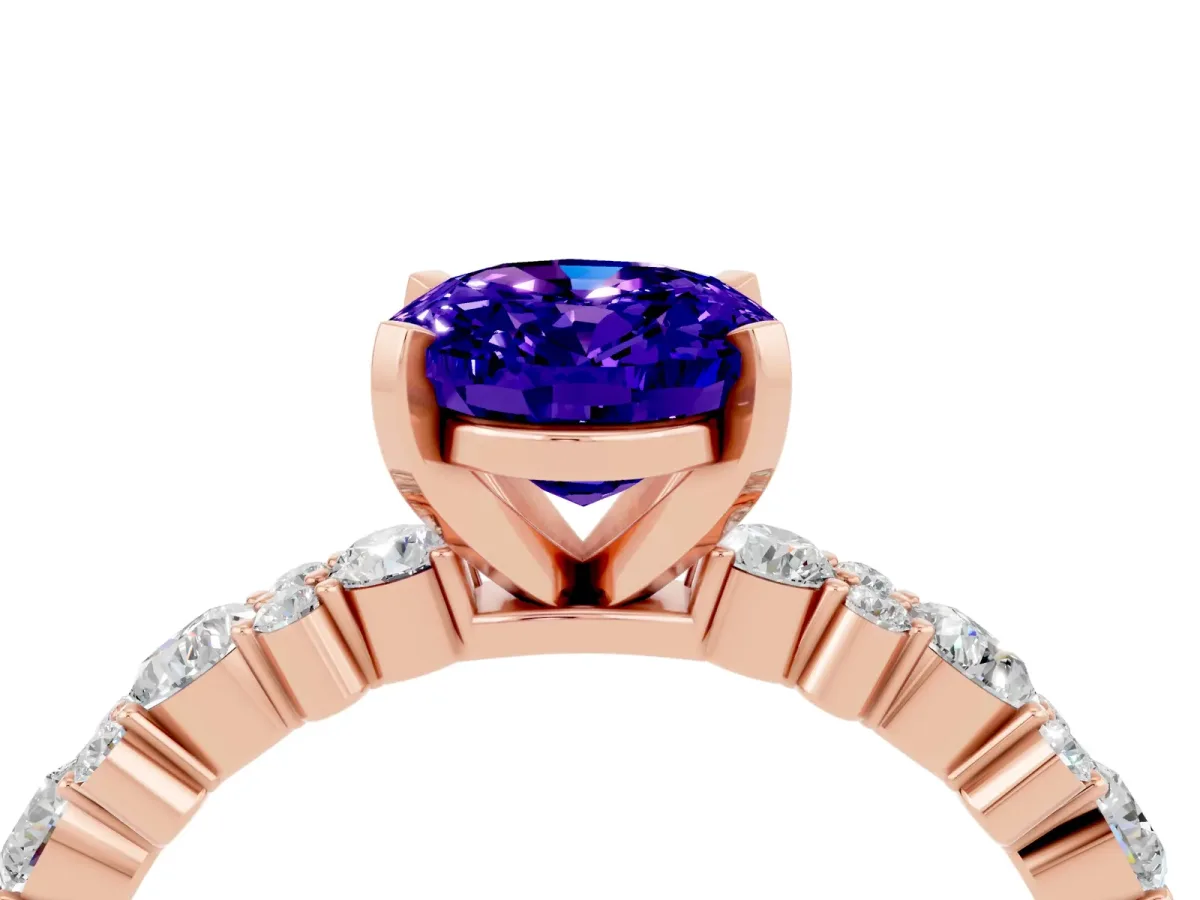 Oval Cut Tanzanite Side Stone Solitaire Ring with Round and Four-Prong Setting Rose gold