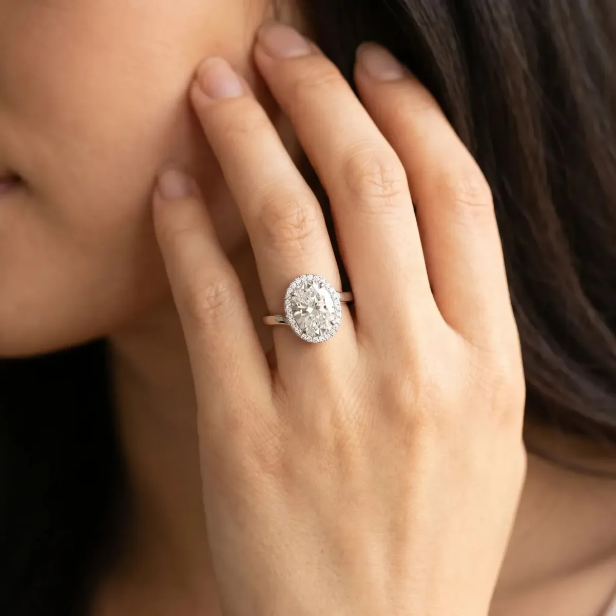 Oval Cut Diamond Bezel Halo Ring with Plain Band Silver