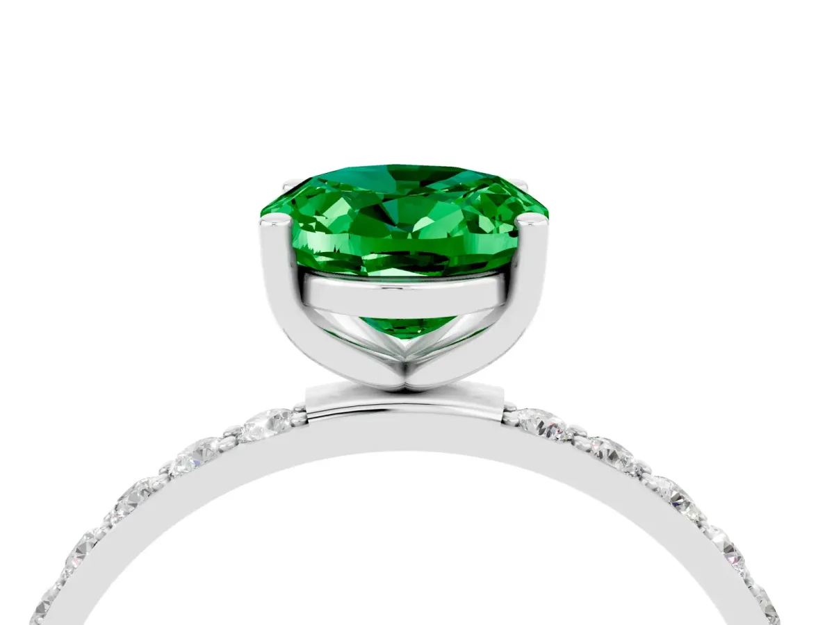 Oval Cut Emerald Solitaire Ring with Round Pavé Band and Prong Setting Silver