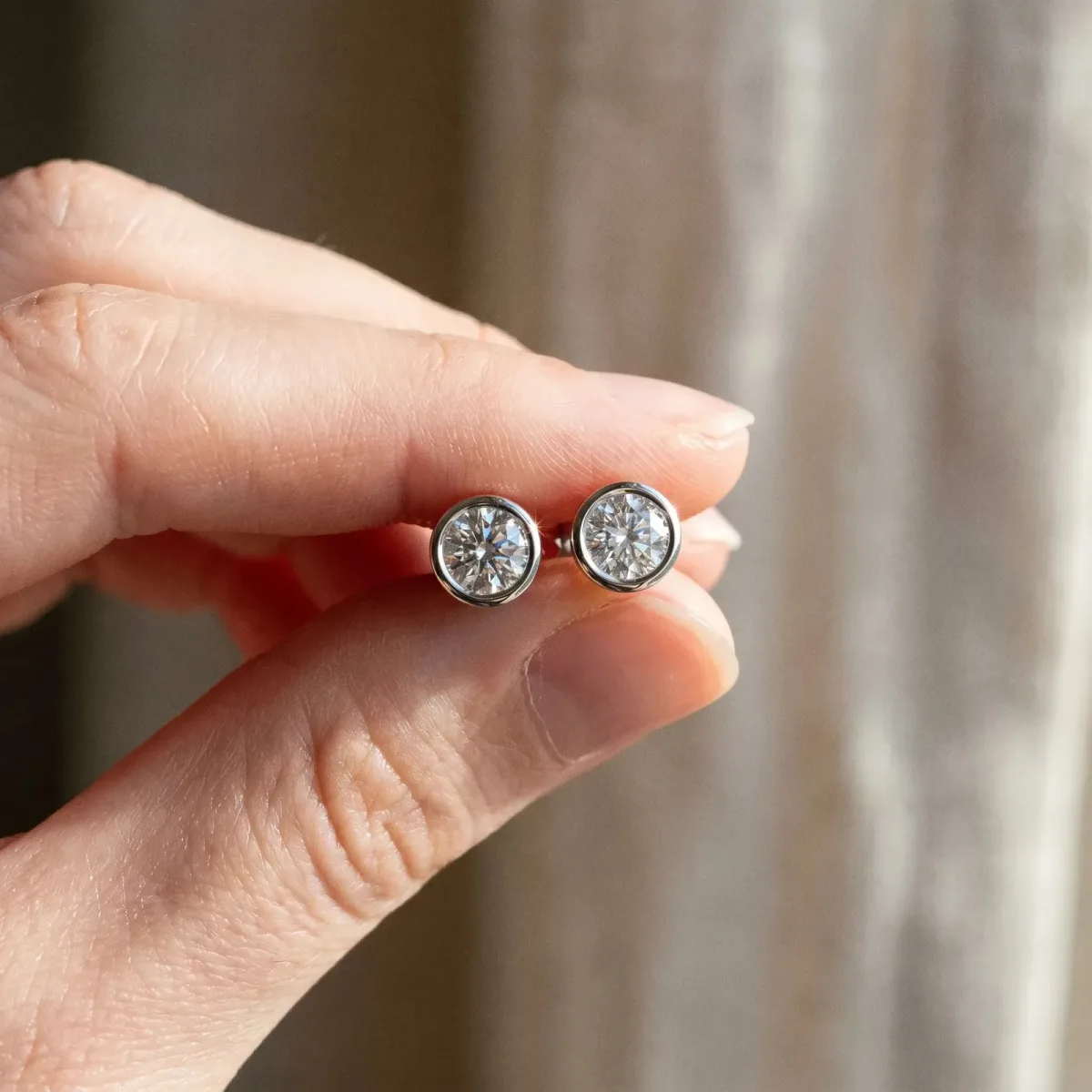 Bezel Set Round Diamond Stud Earrings with Push Back White gold