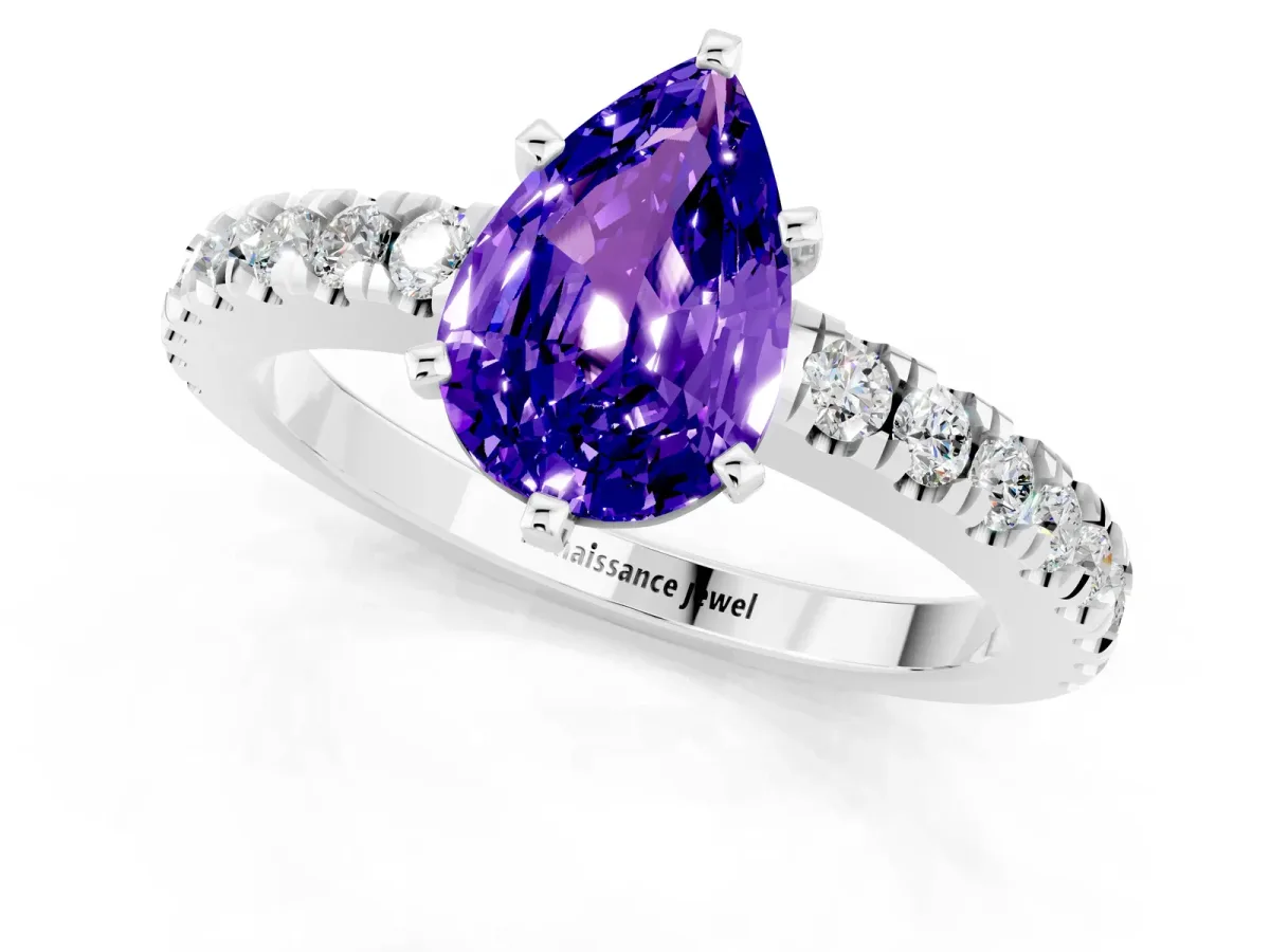 Pear Cut Solitaire Tanzanite with Pavé Band and Four-Prong Setting Silver