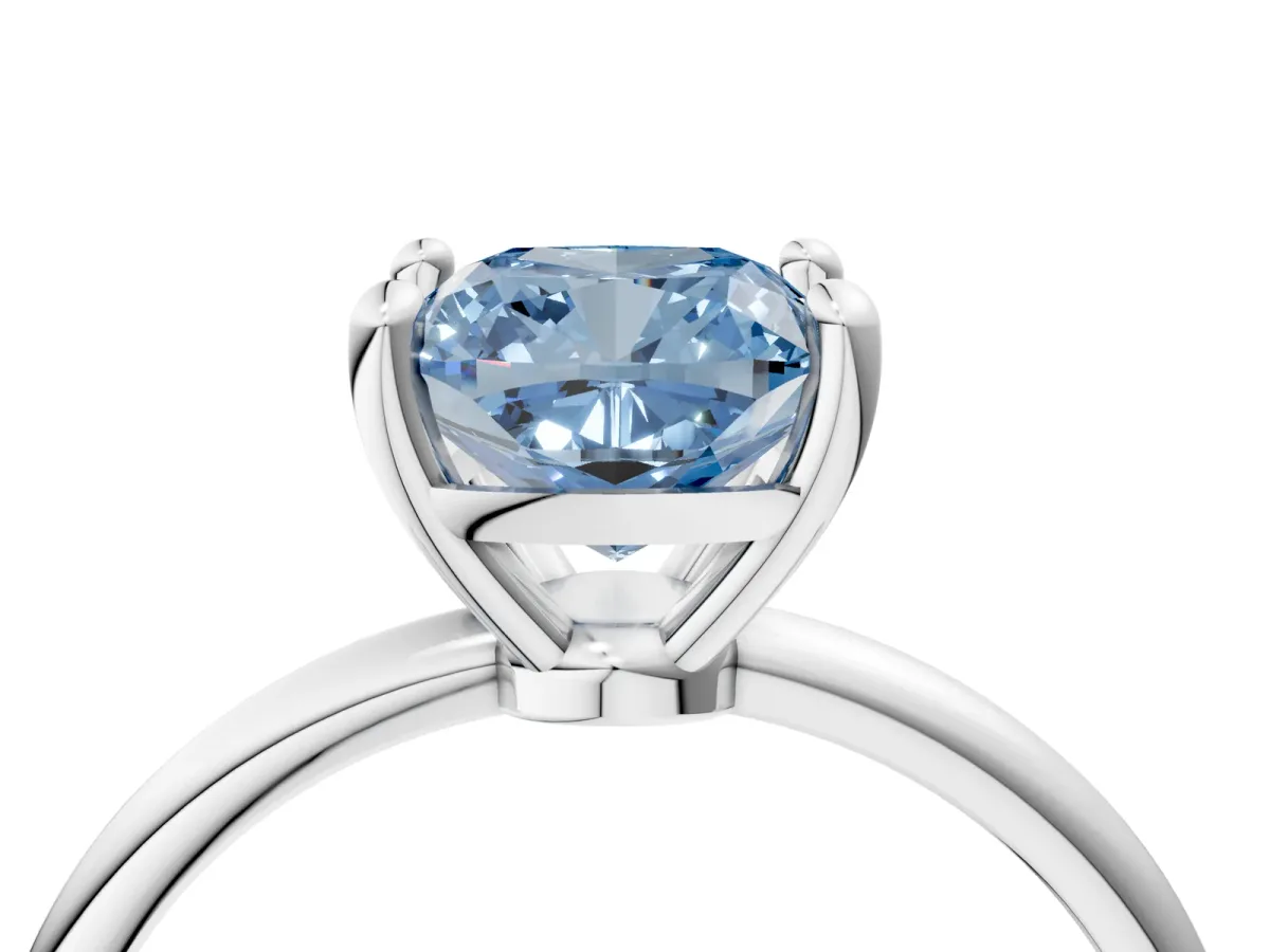 Fancy Blue Cushion Cut Solitaire Diamond Ring with 4-Prong Setting on a Classic Band Silver