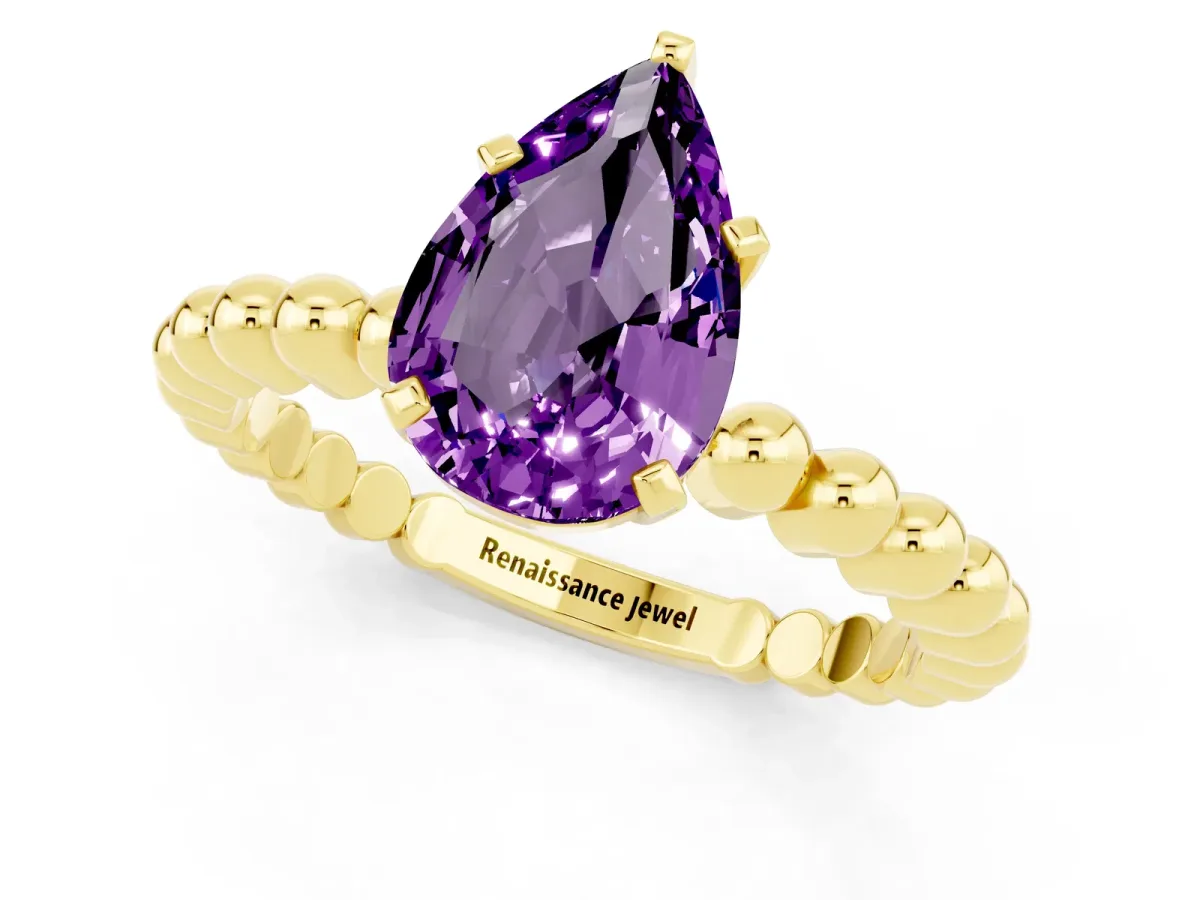 Pear Cut Amethyst Solitaire Ring with Beaded Band and Prong Setting Yellow gold