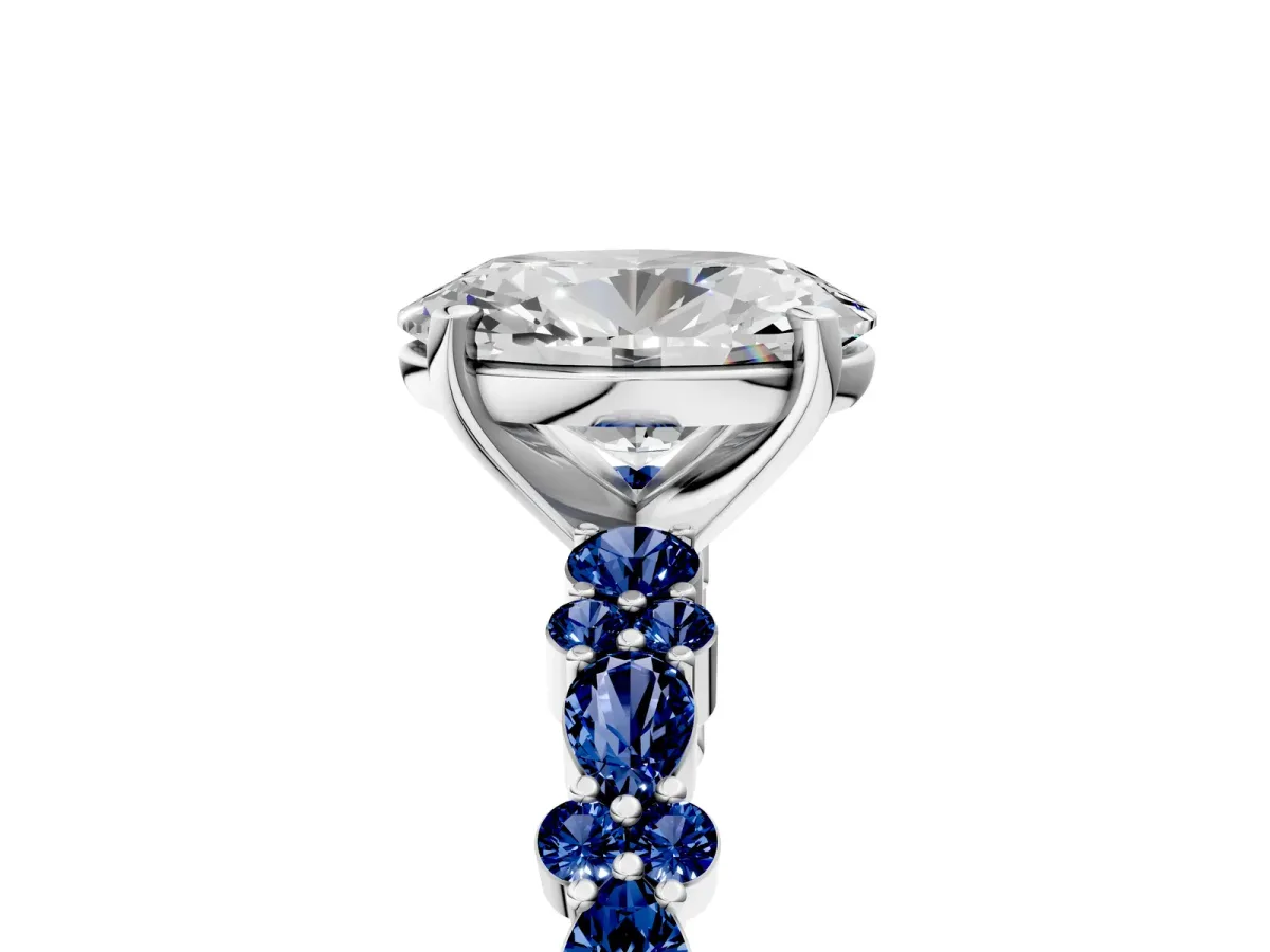 Oval Cut Diamond Side Stone Solitaire Ring with Round Blue Sapphire and Four-Prong Setting Silver