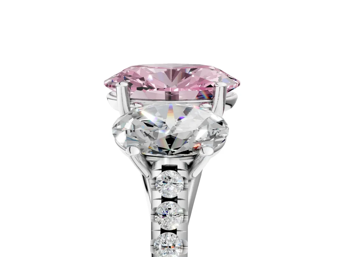 Fancy Pink Three-Stone Oval Cut Diamond Ring with Round Pavé Band and Prong Setting Silver