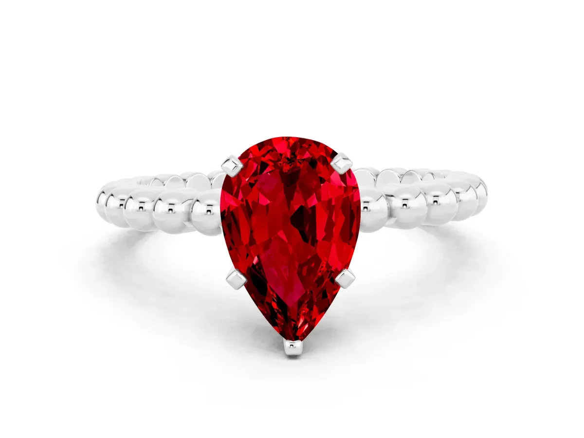 Pear Cut Ruby Solitaire Ring with Beaded Band and Prong Setting Silver