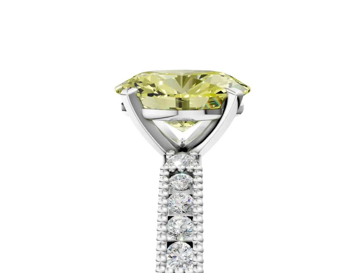 Fancy Yellow Oval Cut Solitaire with Pavé Band and Four-Prong Setting Silver