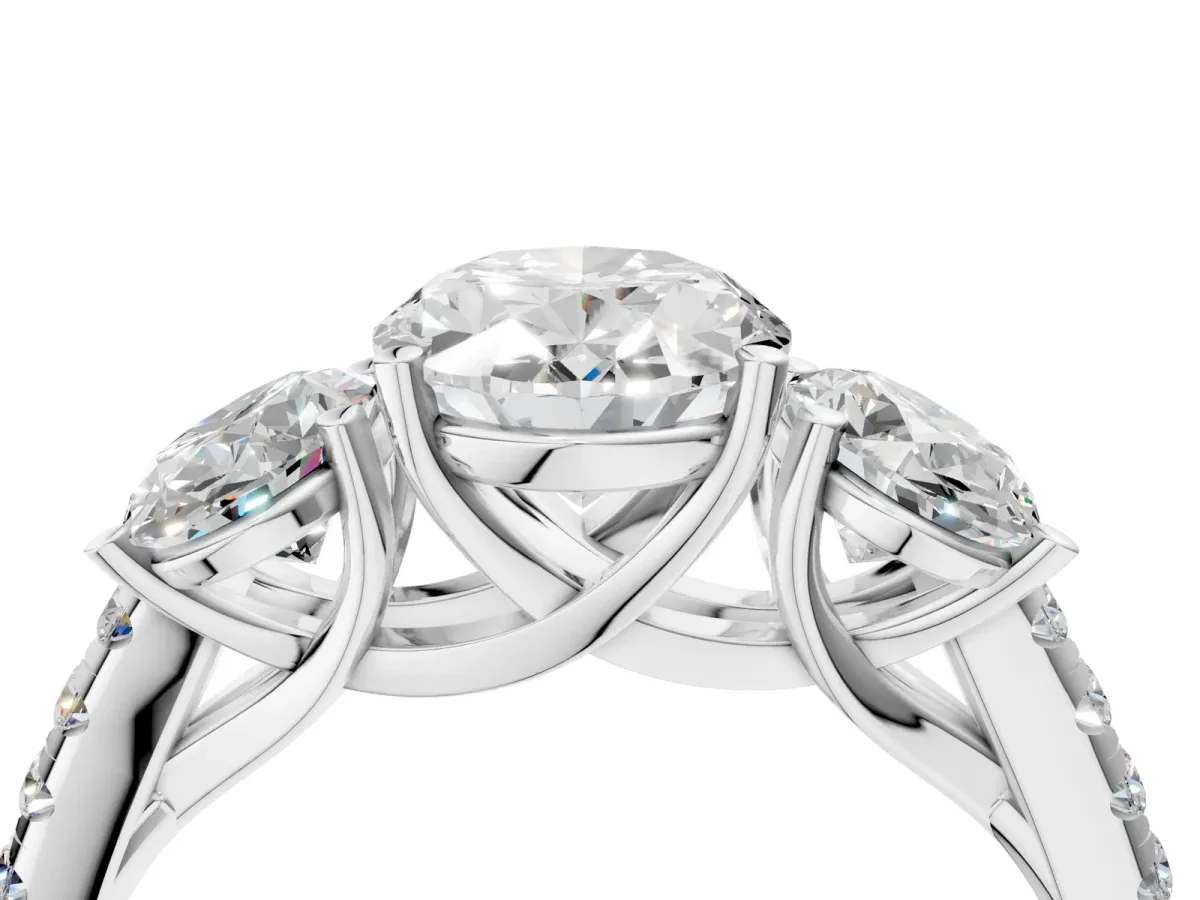 Three-Stone Oval Cut Diamond Ring with Round Pavé Band and Prong Setting Platinum