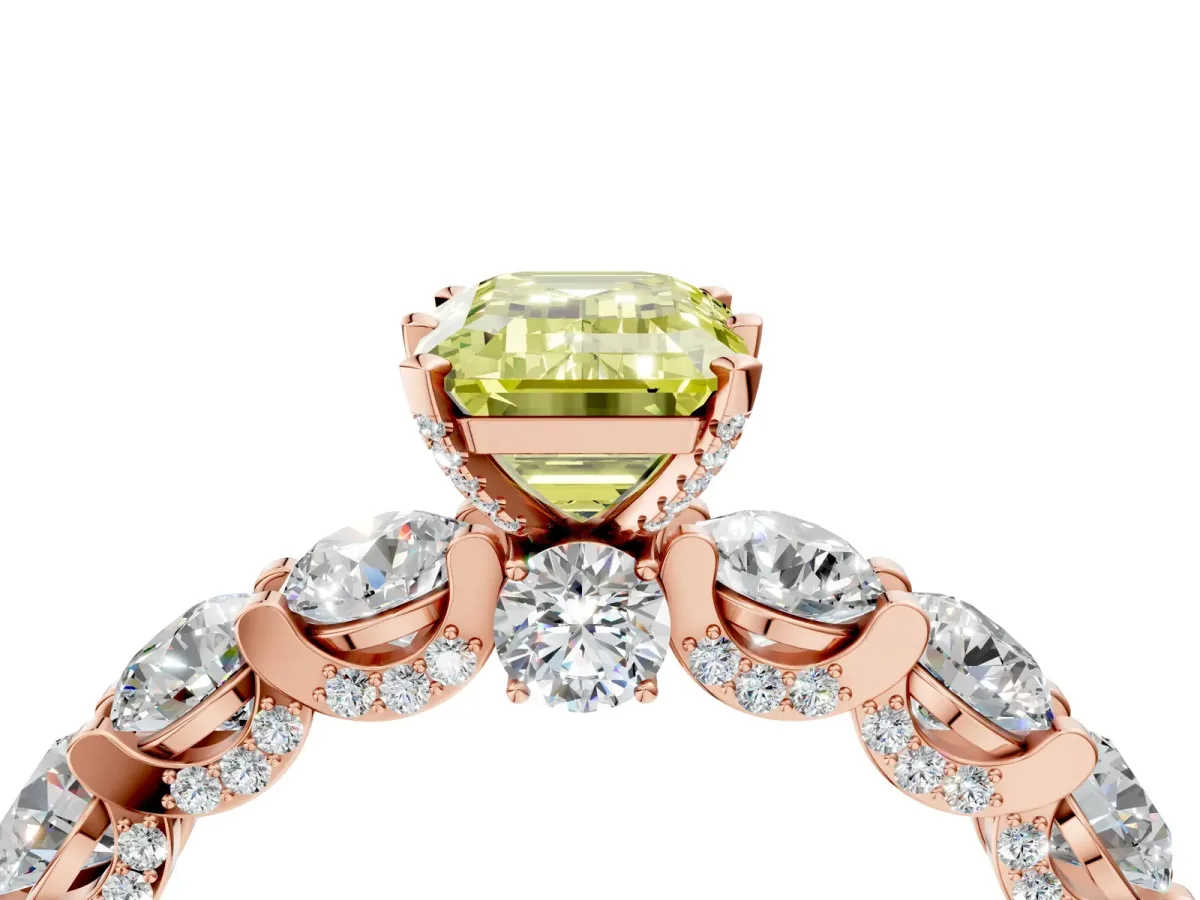 Fancy Yellow Emerald Cut Diamond Side Stone Engagement Ring with Four-Prong Setting Rose gold