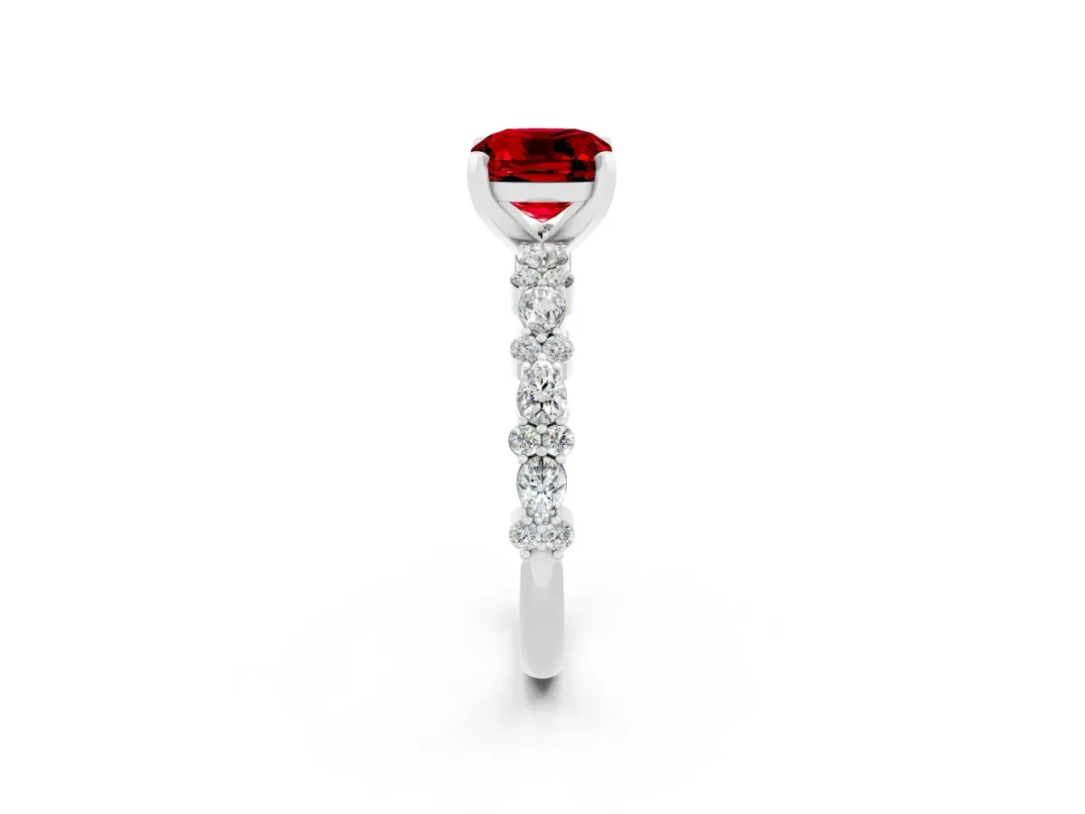 Cushion Cut Ruby Side Stone Solitaire Ring with Round and Four-Prong Setting White gold
