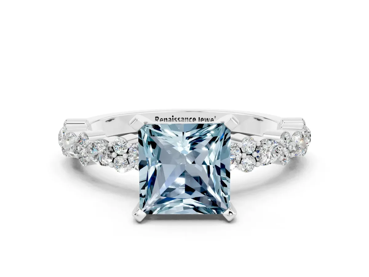 Princess Cut Aquamarine Side Stone Solitaire Ring with Round and Four-Prong Setting Silver