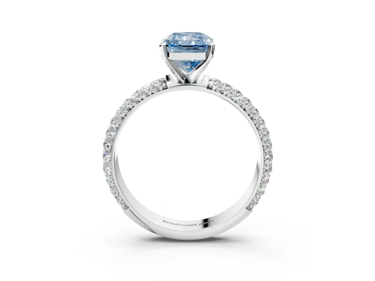 Fancy Blue Radiant Cut Diamond Solitaire Ring with Prong Setting and Pavé Band Platinum