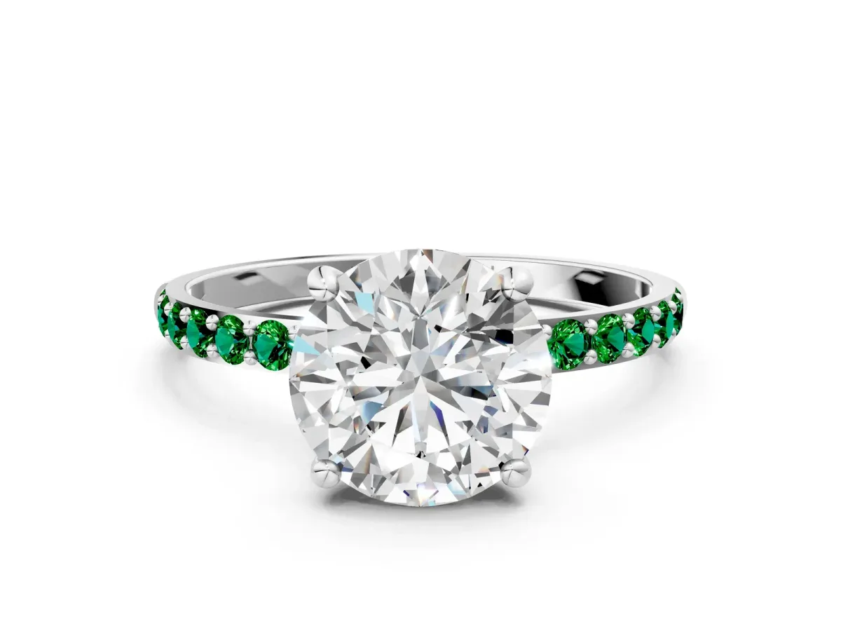 Round Cut Diamond Solitaire Ring with Round Emerald Pavé Band and Prong Setting Platinum