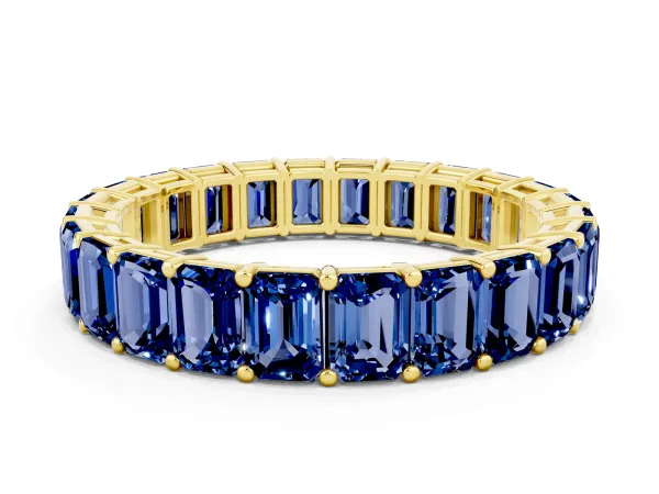 Emerald Cut Blue Sapphire Eternity Band with Shared Prong Setting Yellow gold