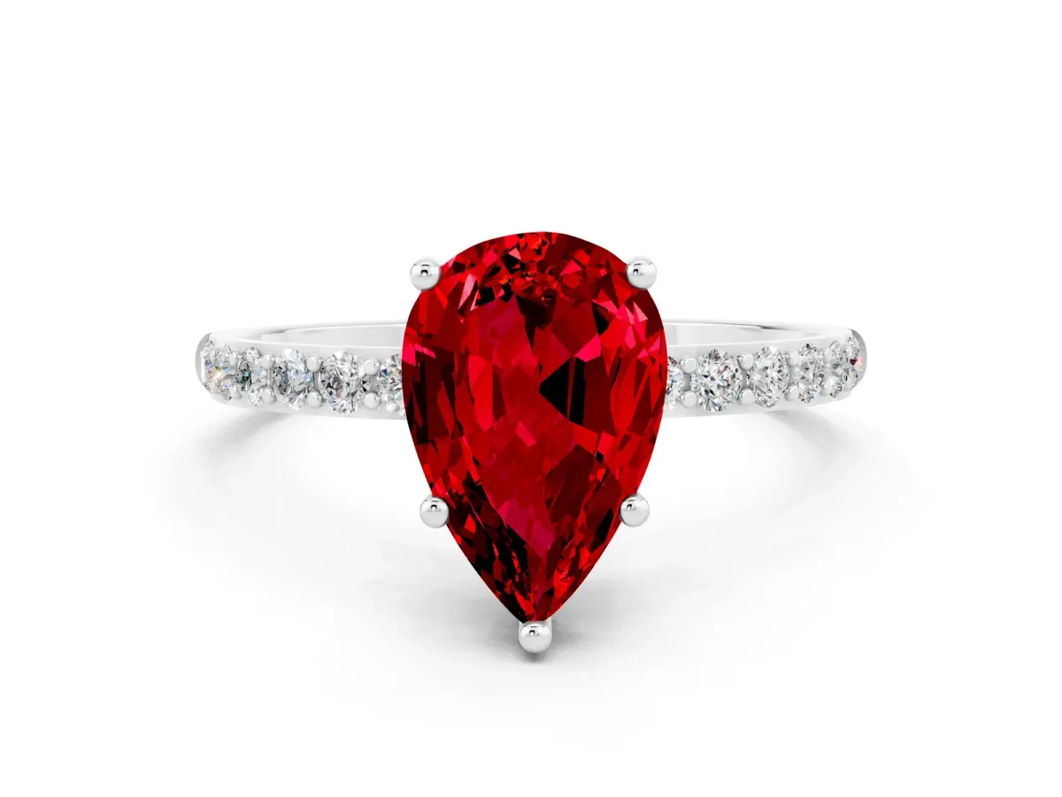 Pear Cut Ruby Solitaire Ring with Round Pavé Band and Prong Setting Silver