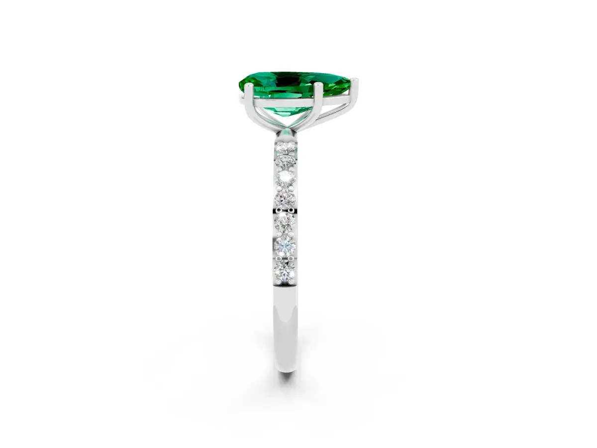 Pear Cut Emerald Solitaire Ring with Round Pavé Band and Prong Setting White gold