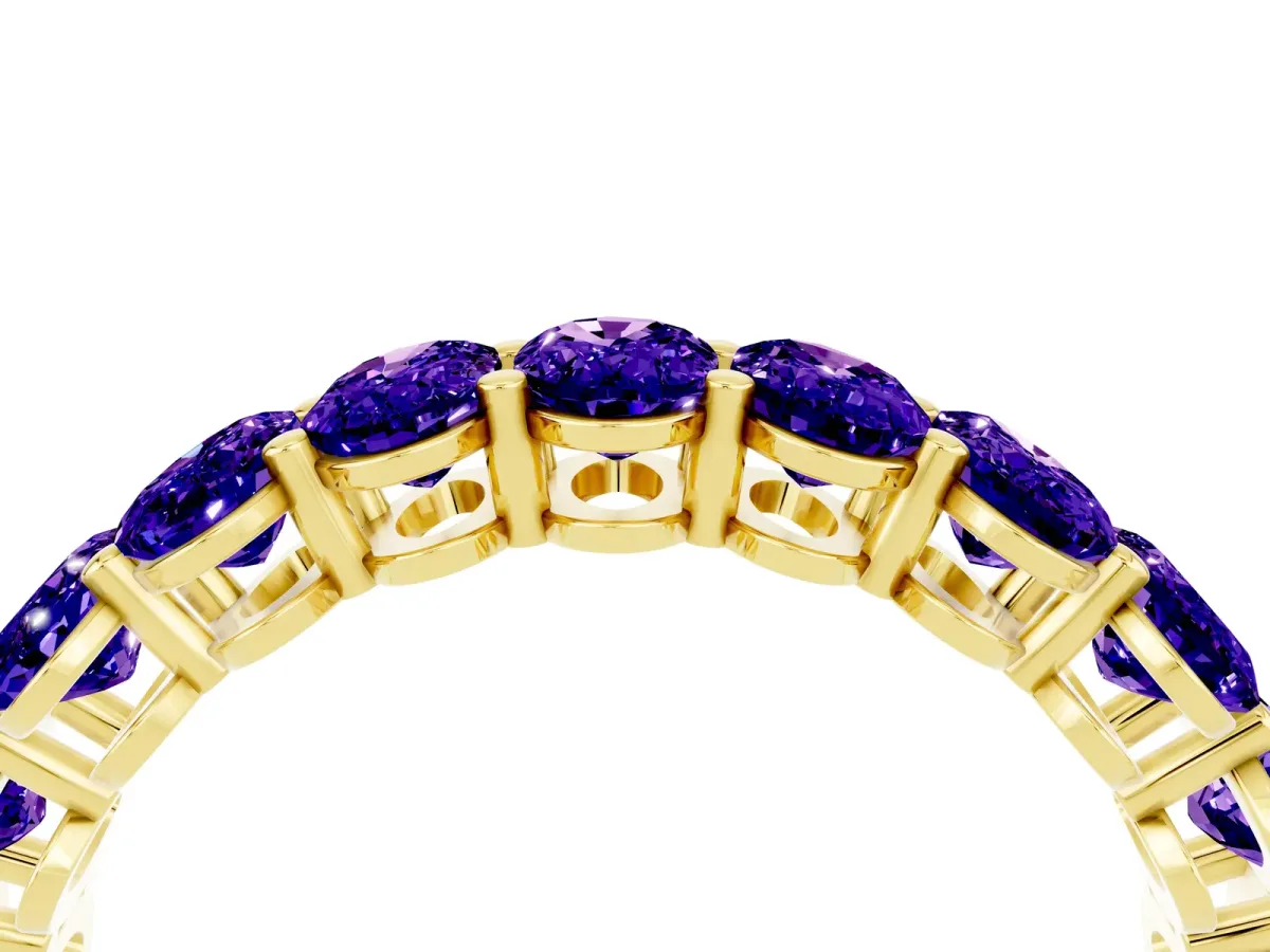 Oval Cut Tanzanite Eternity Band with Shared Prong Setting Yellow gold