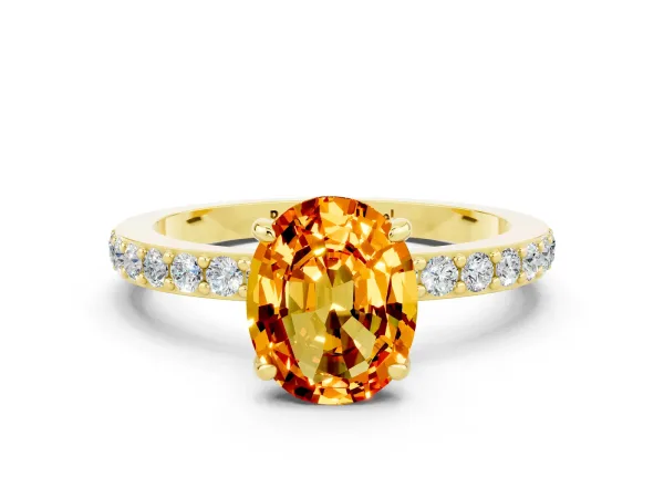 Oval Cut Citrine Solitaire Engagement Ring with Pavé Band and Four-Prong Setting Yellow gold