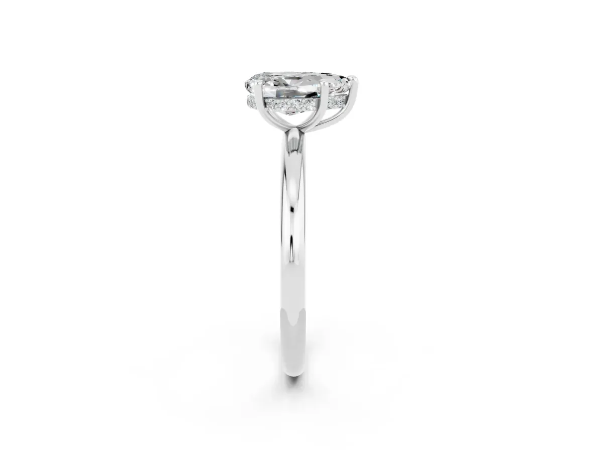 Pear Cut Moissanite Solitaire Ring with Thin Band and Four-Prong Setting Silver