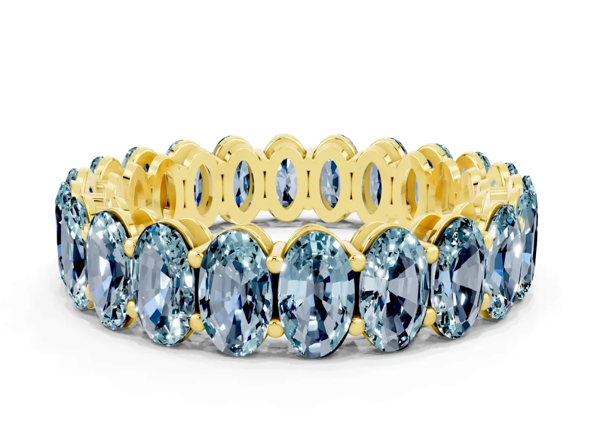 Oval Cut Aquamarine Eternity Band with Shared Prong Setting Yellow gold