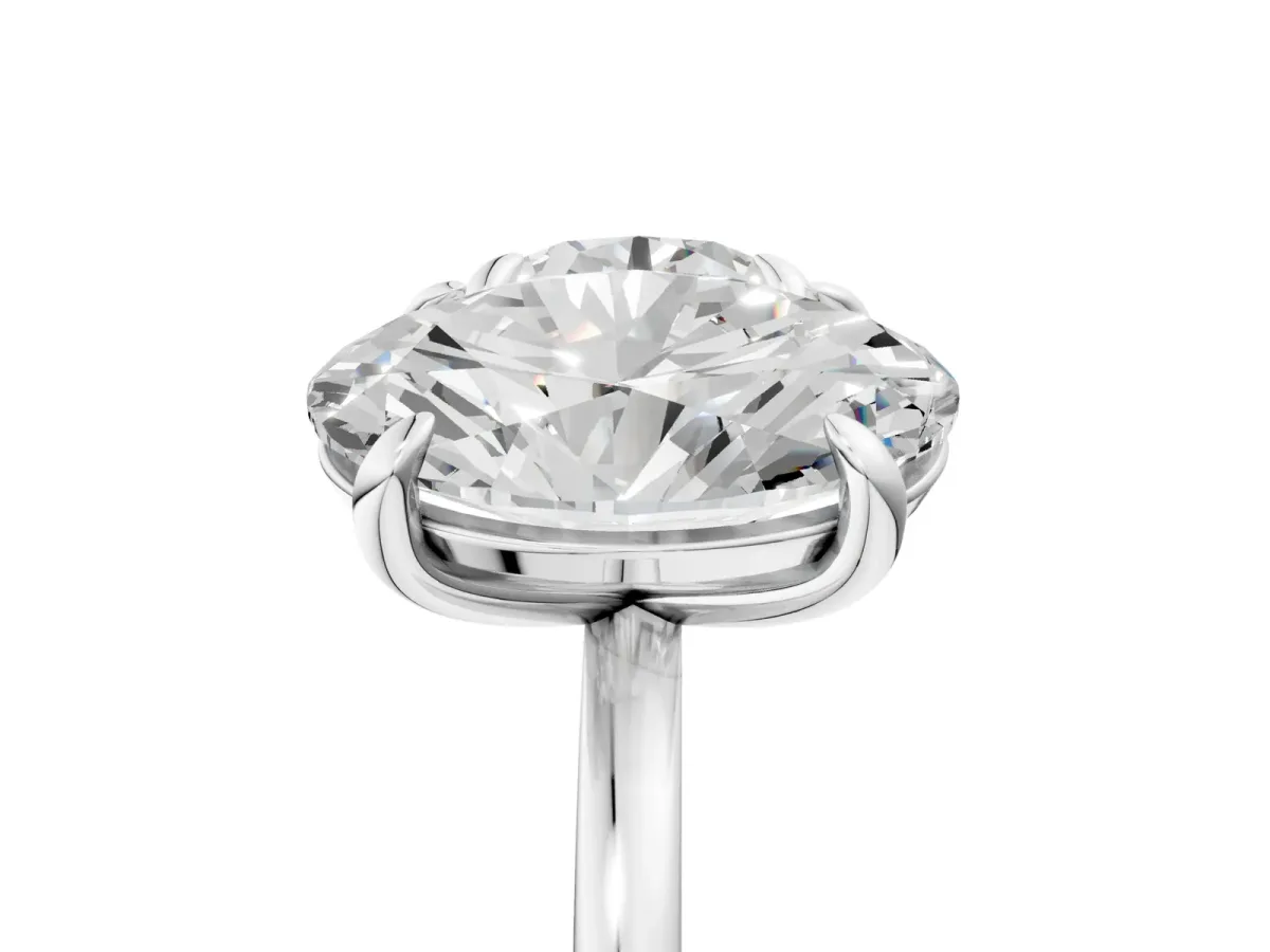 Round and Oval Toi Moi Ring with Prong Setting and Plain Band Platinum
