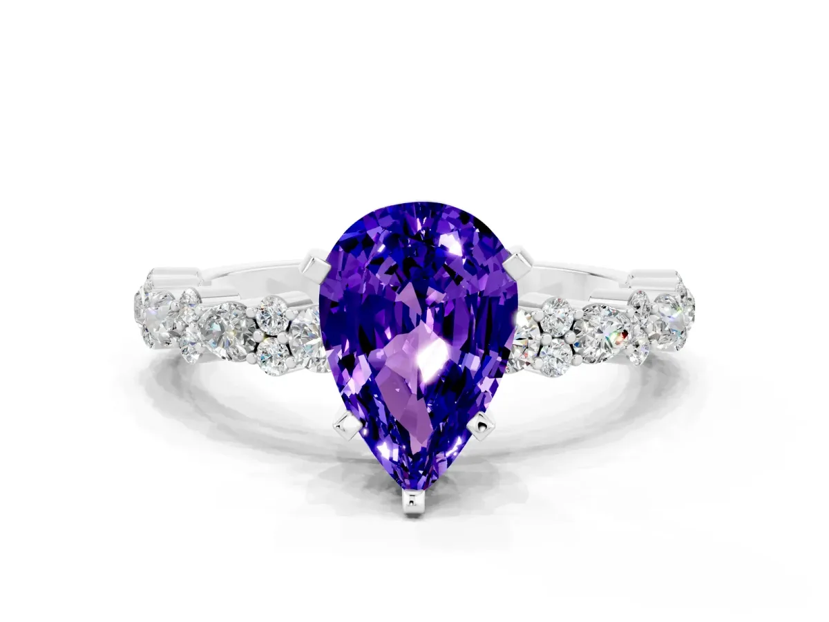 Pear Cut Tanzanite Side Stone Solitaire Ring with Round and Four-Prong Setting White gold