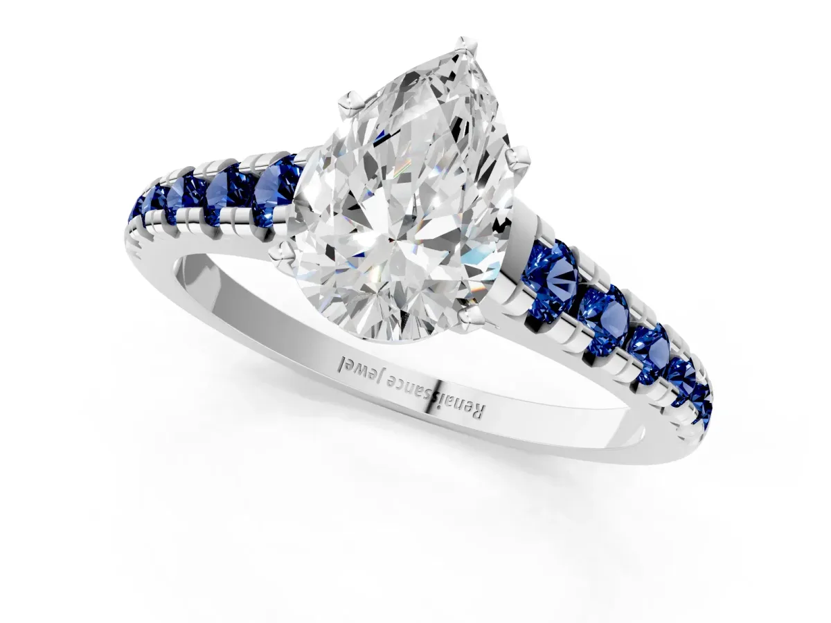 Pear Cut Diamond Cathedral Solitaire Ring with Round Blue Sapphire Pavé Band Silver