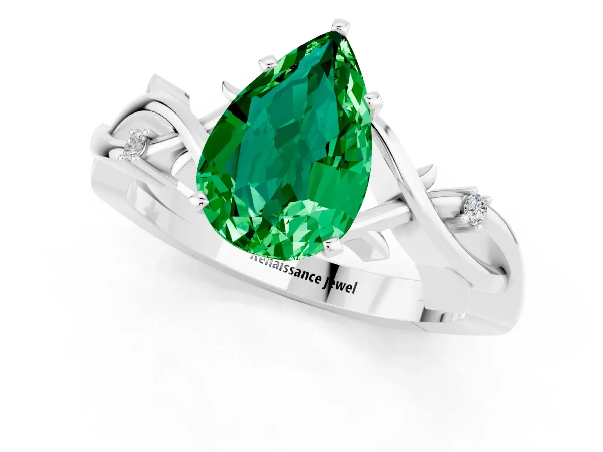 Pear Cut Emerald Solitaire Ring with Twisted Band and Prong Setting Silver