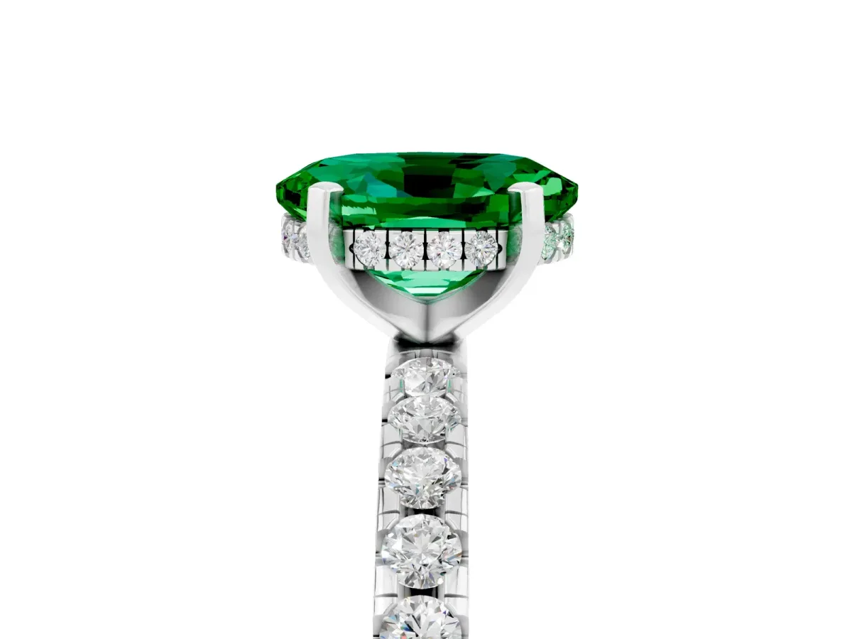 Oval Cut Emerald Solitaire Ring with Round Pavé Band and Four-Prong Setting Silver