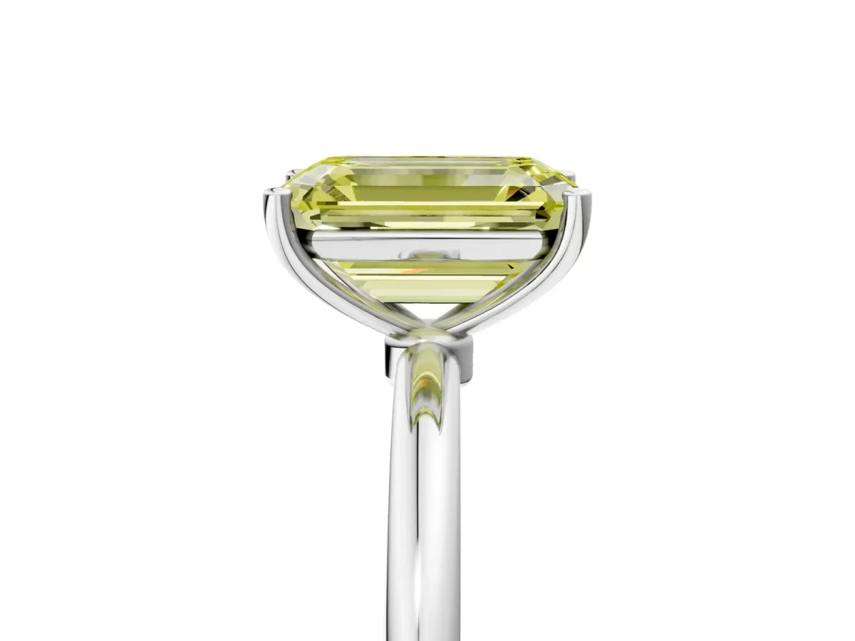 Fancy Yellow Emerald Cut Cut Solitaire Engagement Ring with Thin Band and Four-Prong Setting Silver
