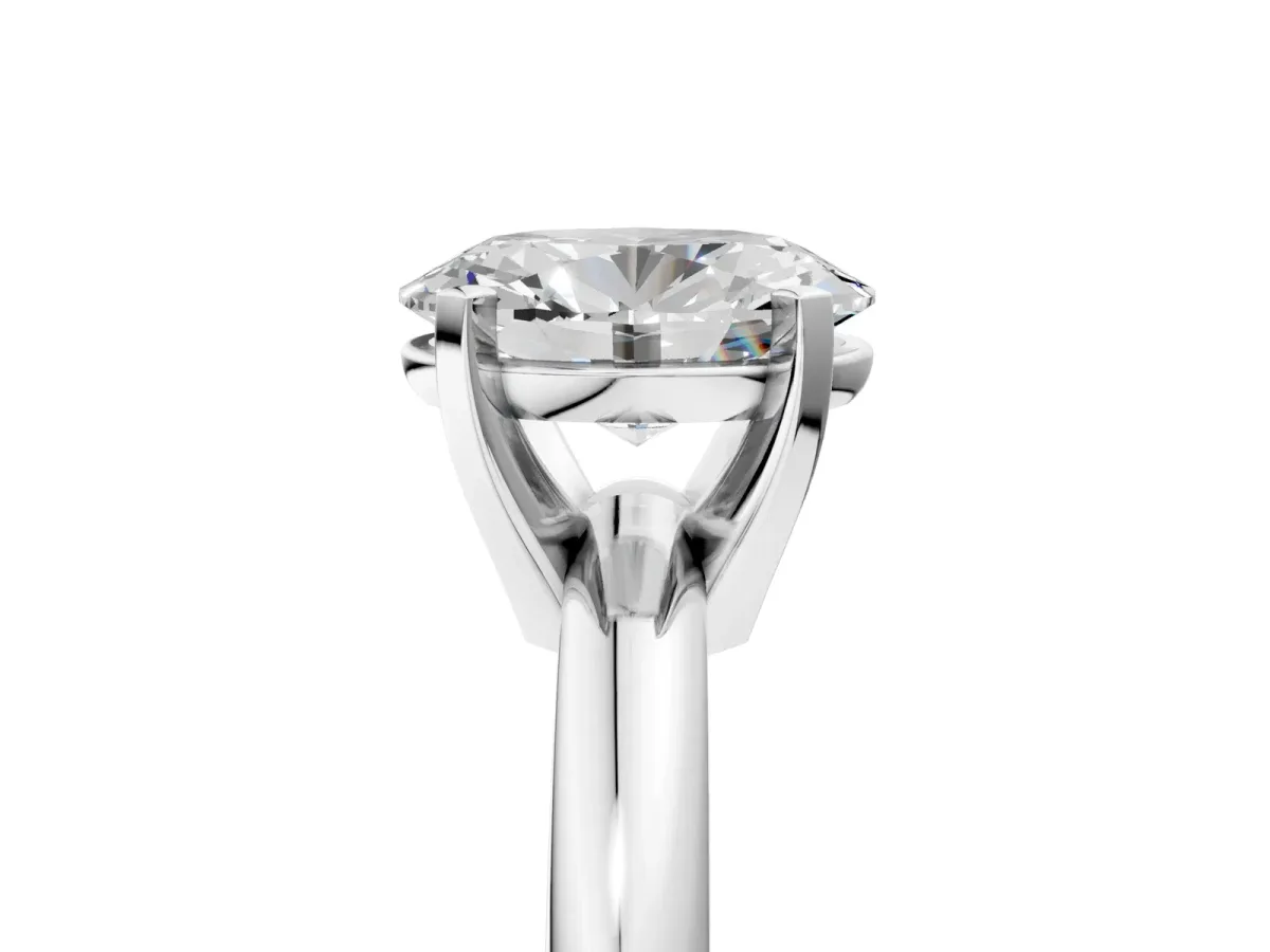 Oval Cut Diamond Solitaire Engagement Ring with Round Band and Four-Prong Setting Silver