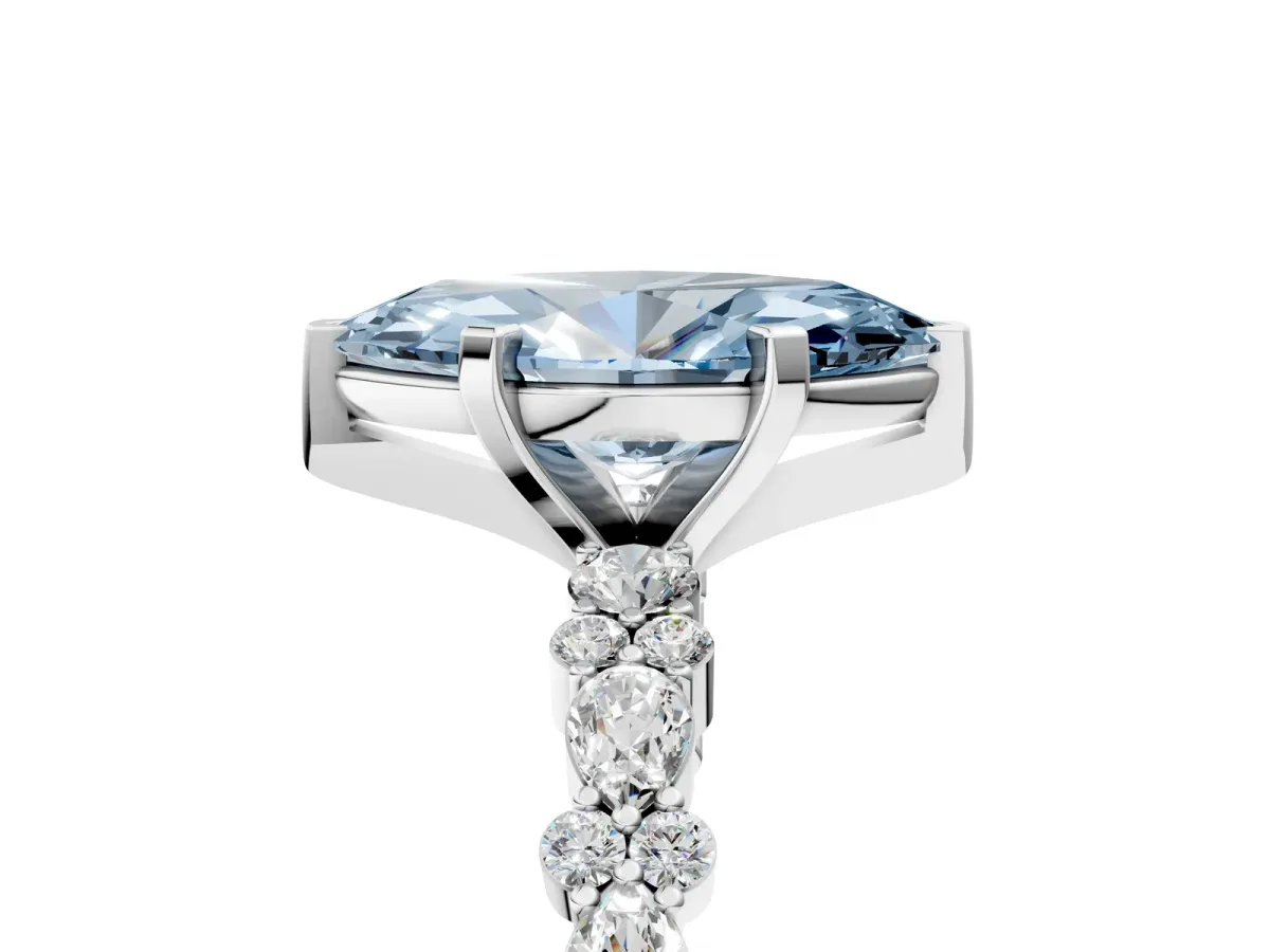 Fancy Blue Marquise Cut Diamond Side Stone Solitaire Ring with Round and Four-Prong Setting Silver