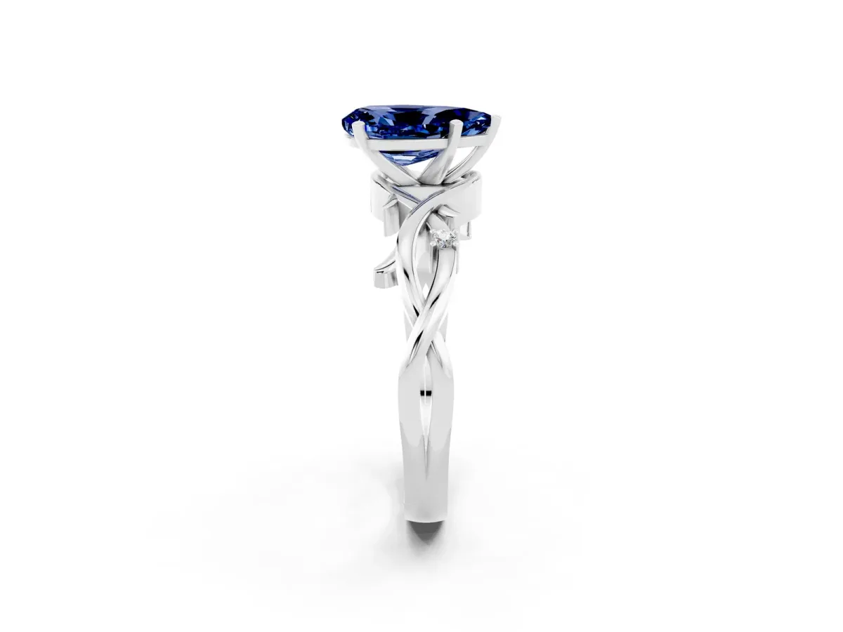 Pear Cut Blue Sapphire Solitaire Ring with Twisted Band and Prong Setting White gold