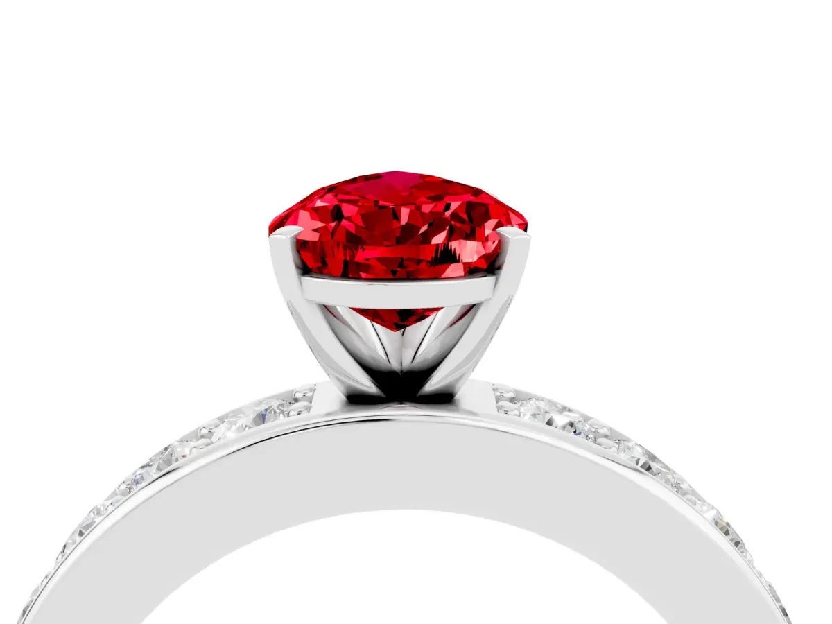 Pear Cut Ruby Engagement Ring with Channel Set Round Band and Prong Setting White gold