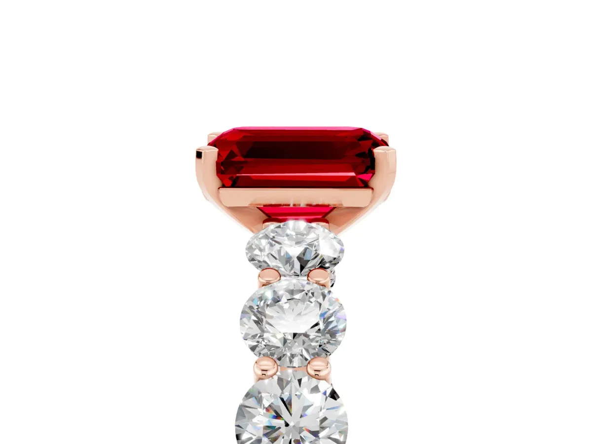 Emerald Cut Ruby Prong Setting with Side Stones on a Pave Band Rose gold
