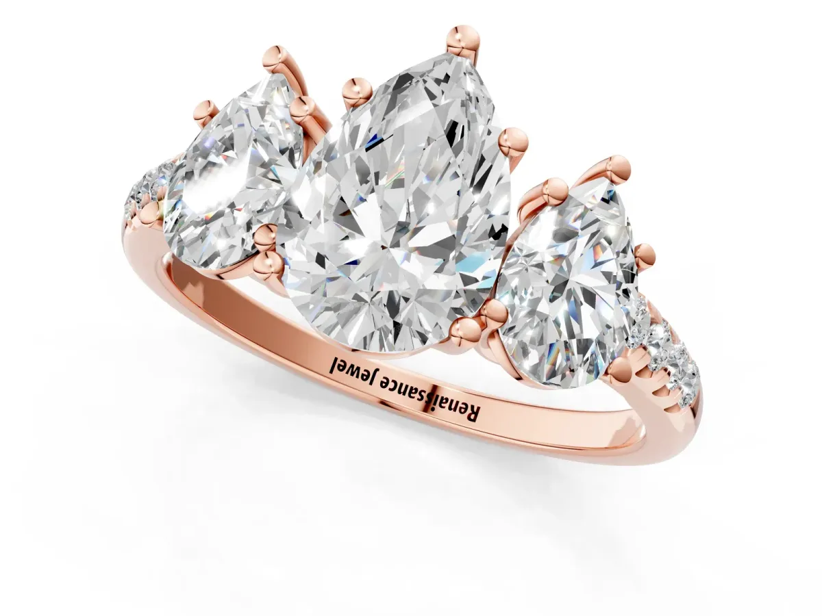 Three-Stone Pear Cut Diamond Ring with Round Pavé Band and Prong Setting Rose gold