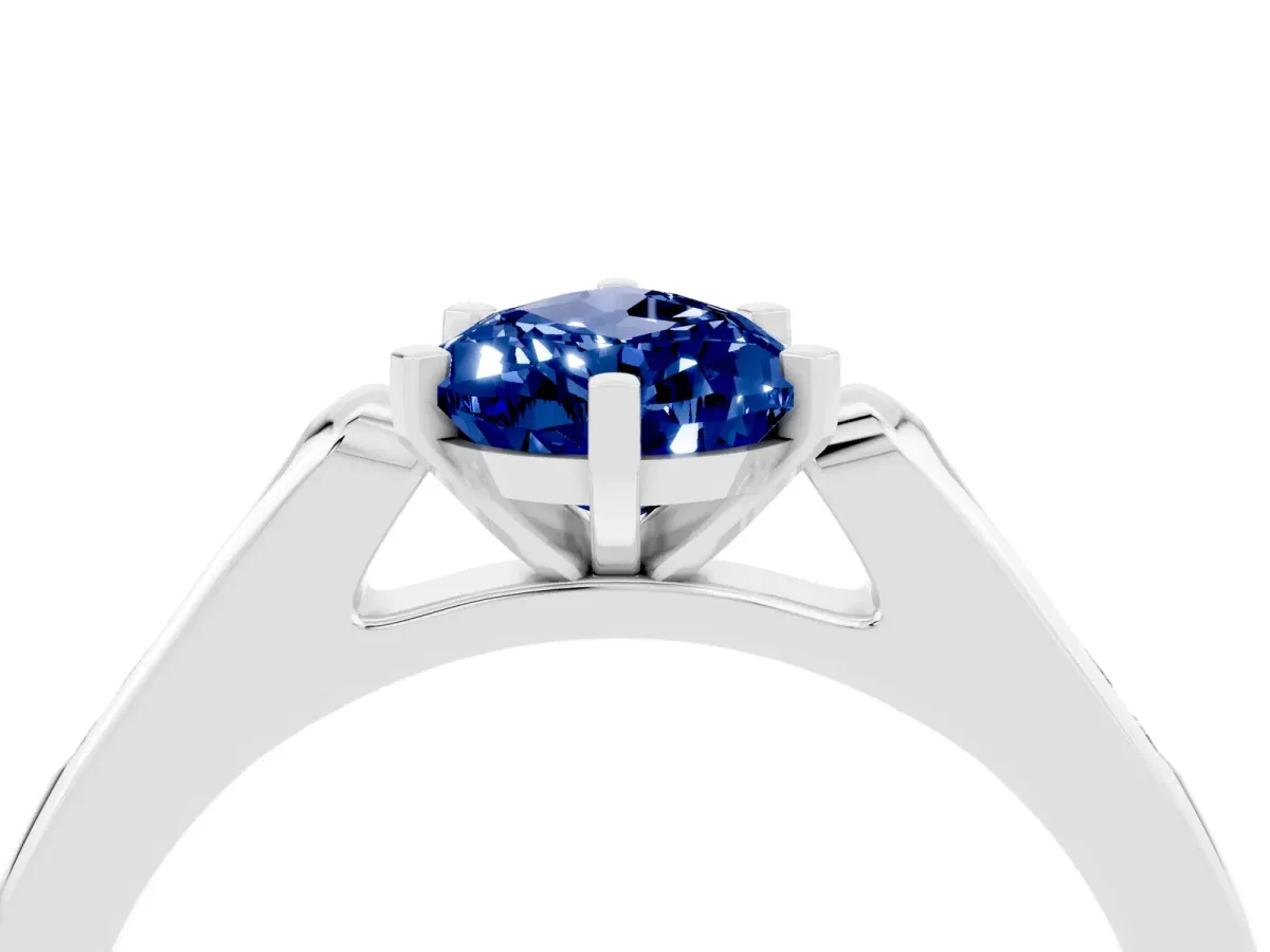 Pear Cut Blue Sapphire Solitaire Ring with Channel Set Round Band and Prong Setting Silver