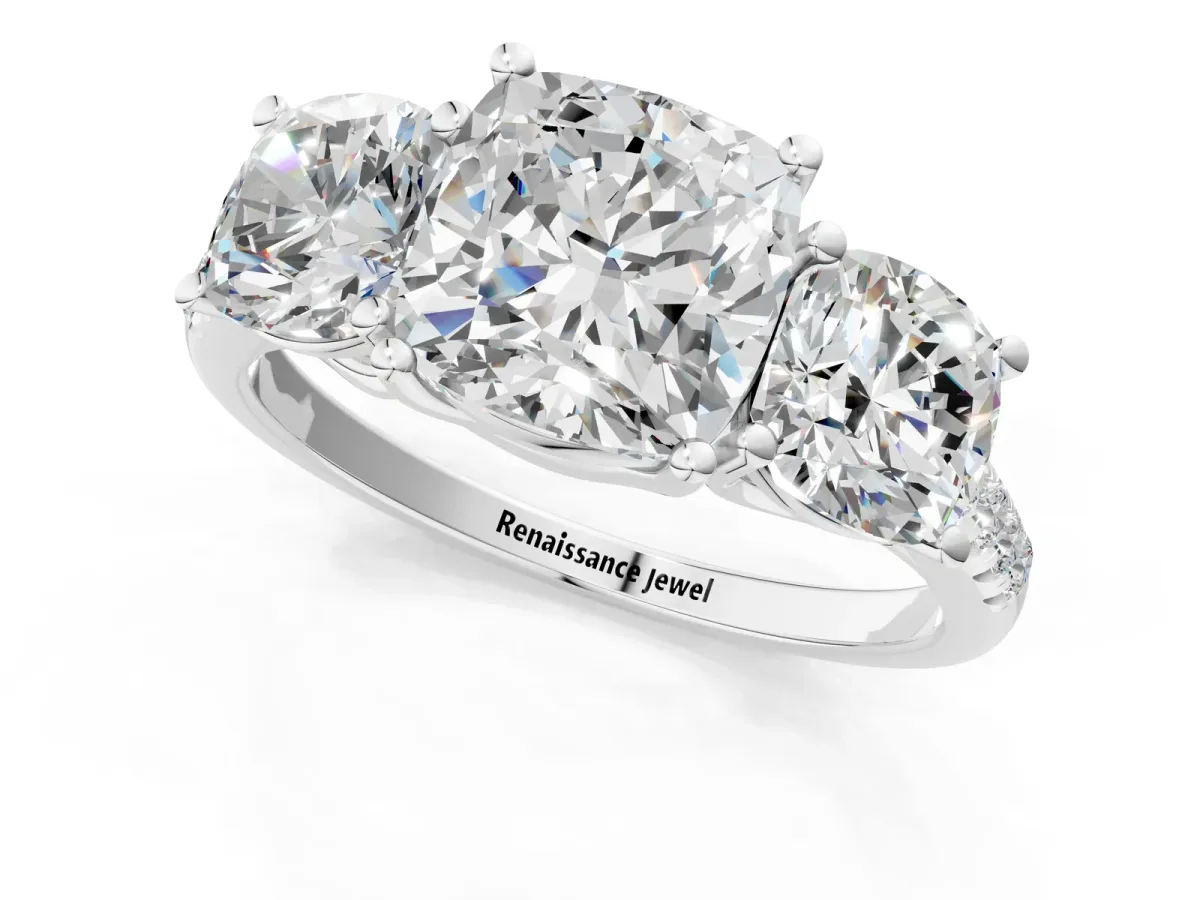 Three-Stone Cushion Cut Diamond Ring with Round Pavé Band and Prong Setting Platinum