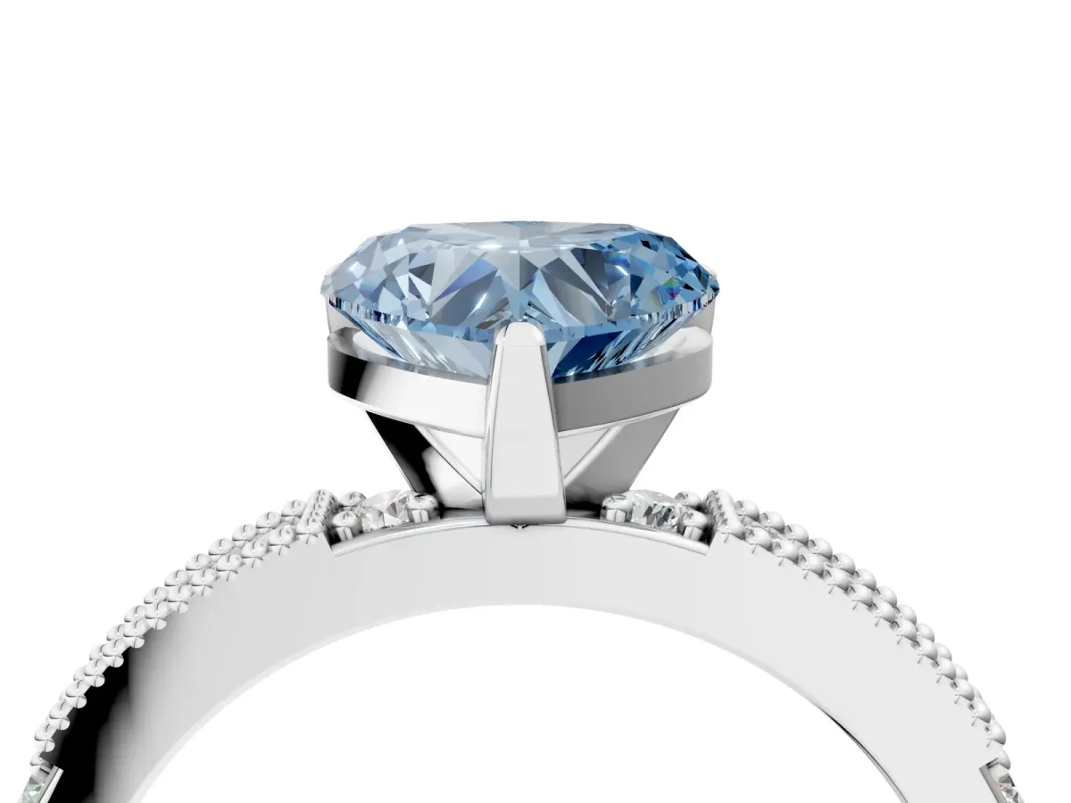 Fancy Blue Heart Cut Solitaire with Pavé Band and Four-Prong Setting Silver