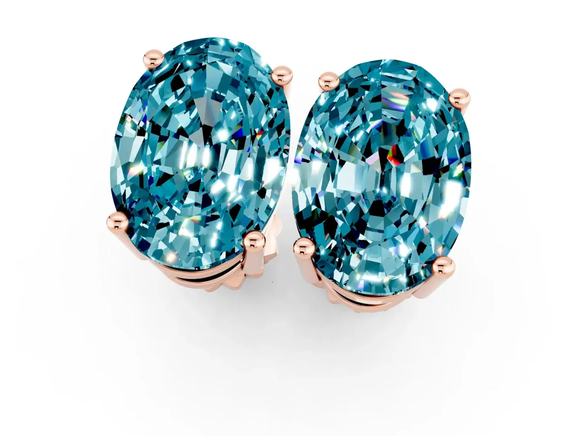 Oval Cut Blue Topaz Stud Earrings Rose gold