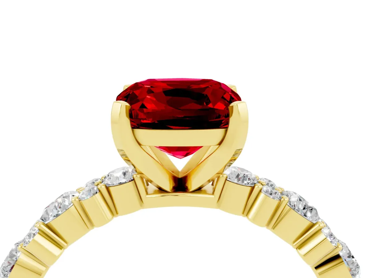 Cushion Cut Ruby Side Stone Solitaire Ring with Round and Four-Prong Setting Yellow gold