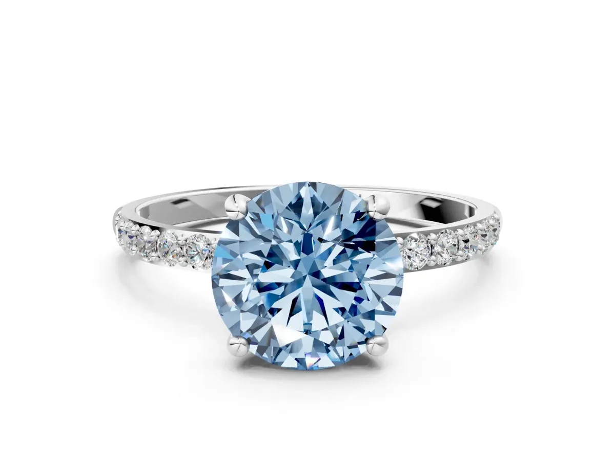 Fancy Blue Round Cut Diamond Solitaire Ring with Round Pavé Band and Prong Setting Silver