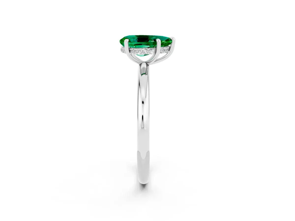 Pear Cut Emerald Solitaire Ring with Thin Band and Four-Prong Setting Silver