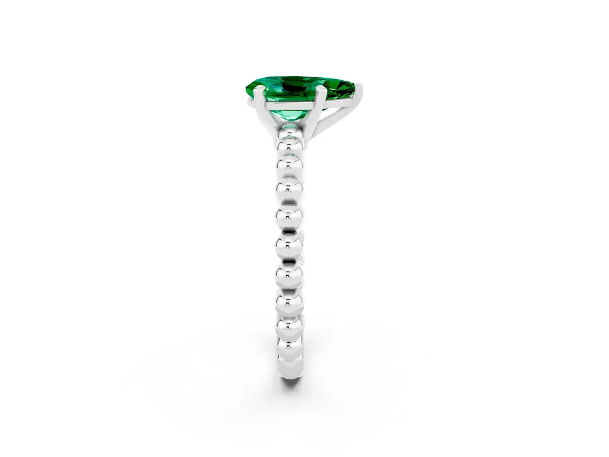 Pear Cut Emerald Solitaire Ring with Beaded Band and Prong Setting White gold