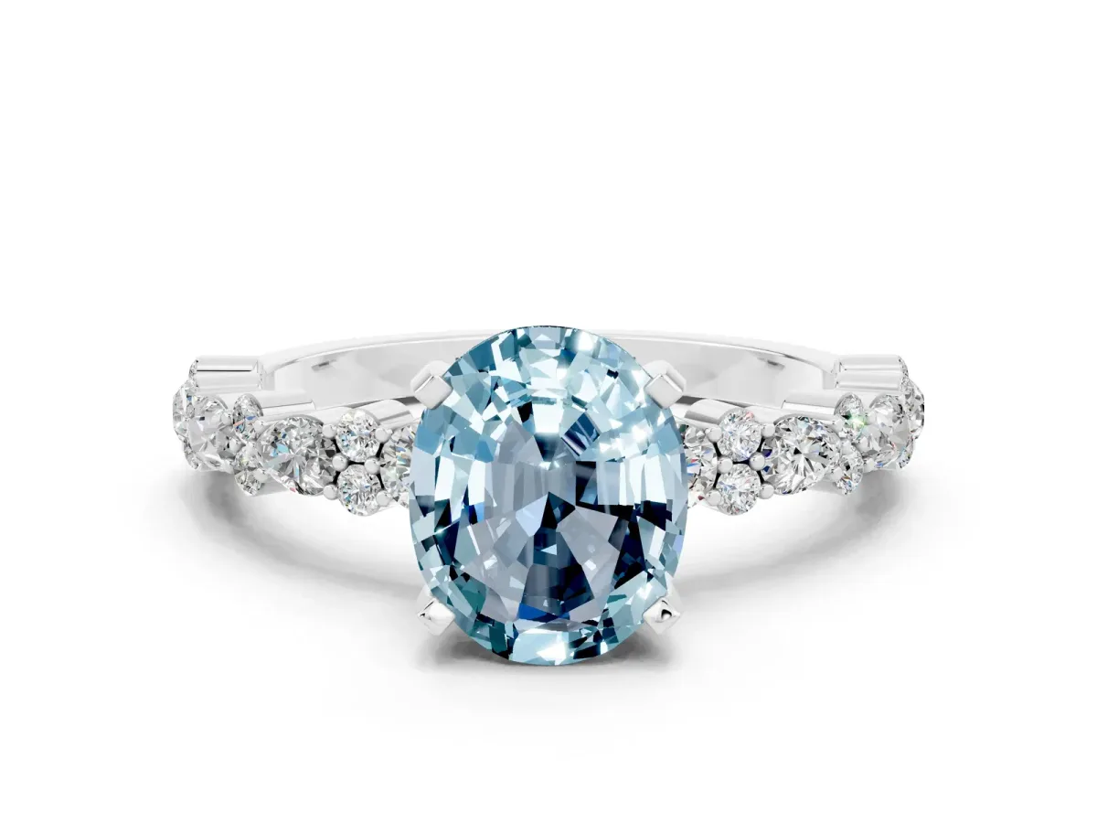 Oval Cut Aquamarine Side Stone Solitaire Ring with Round and Four-Prong Setting Platinum