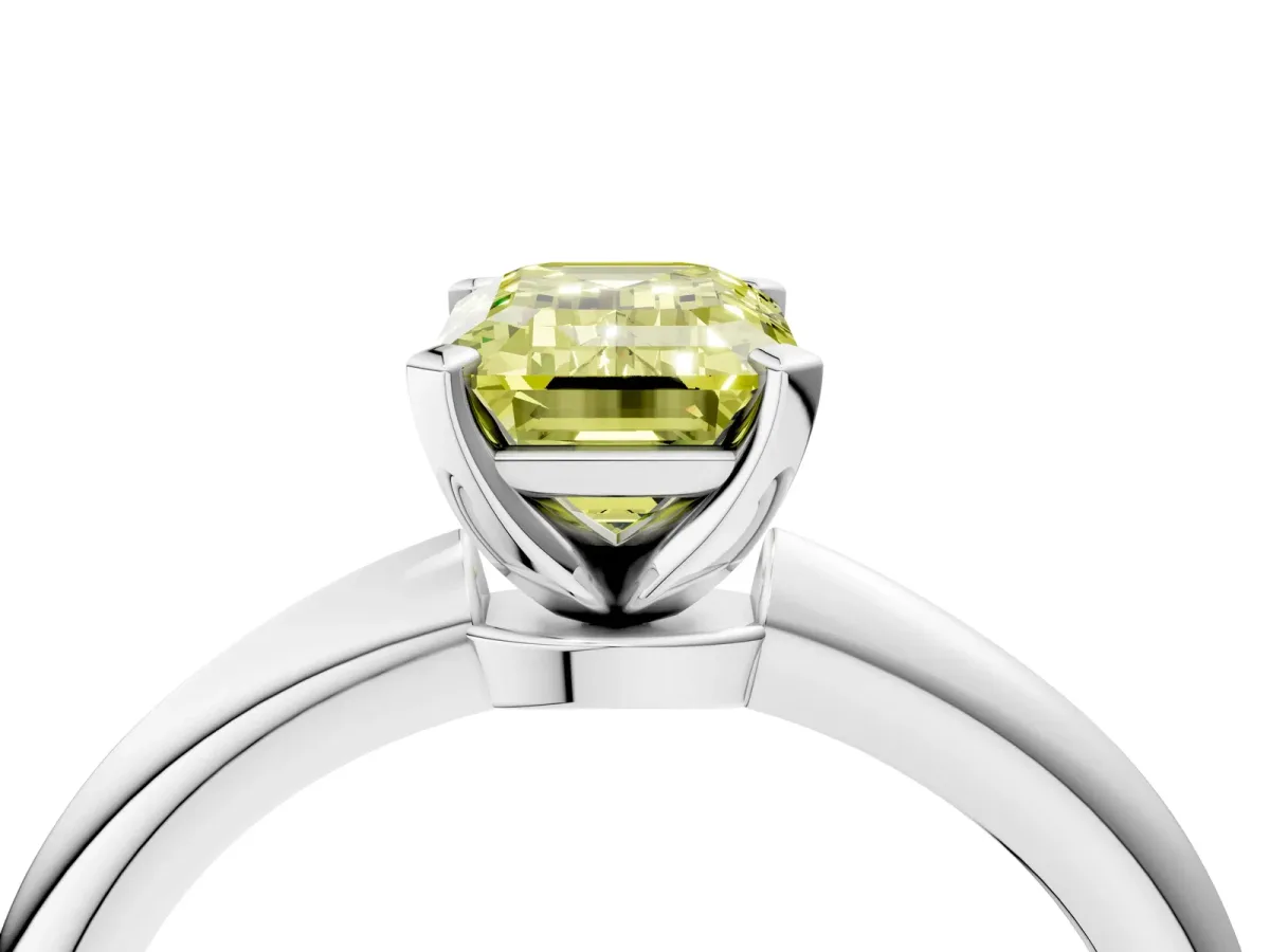 Fancy Yellow Emerald Cut Diamond Solitaire Ring with Six-Prong Setting and Classic Band Platinum