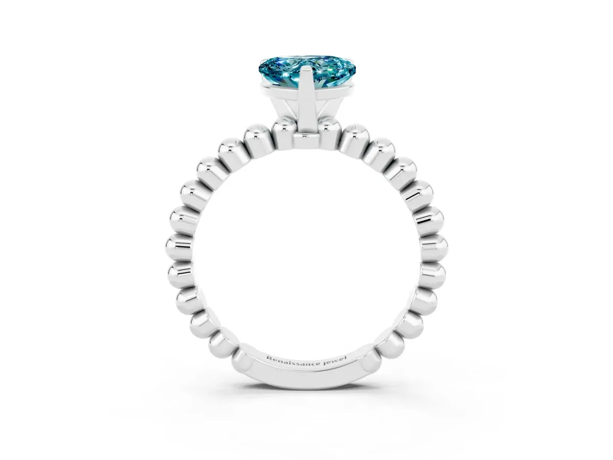 Heart Cut Blue Topaz Solitaire Ring with Beaded Band and Prong Setting Silver