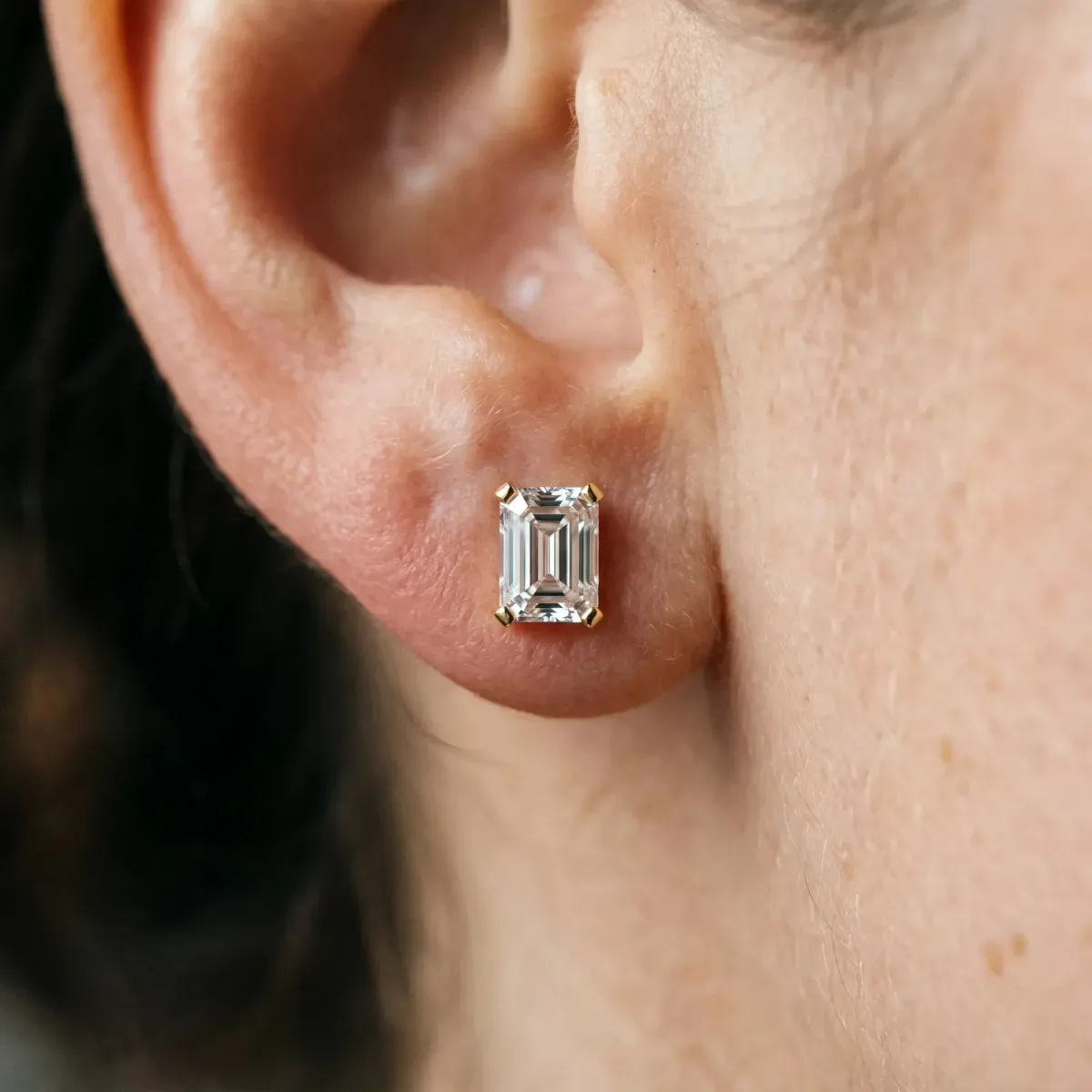 Emerald Cut Diamond Stud Earrings Yellow gold