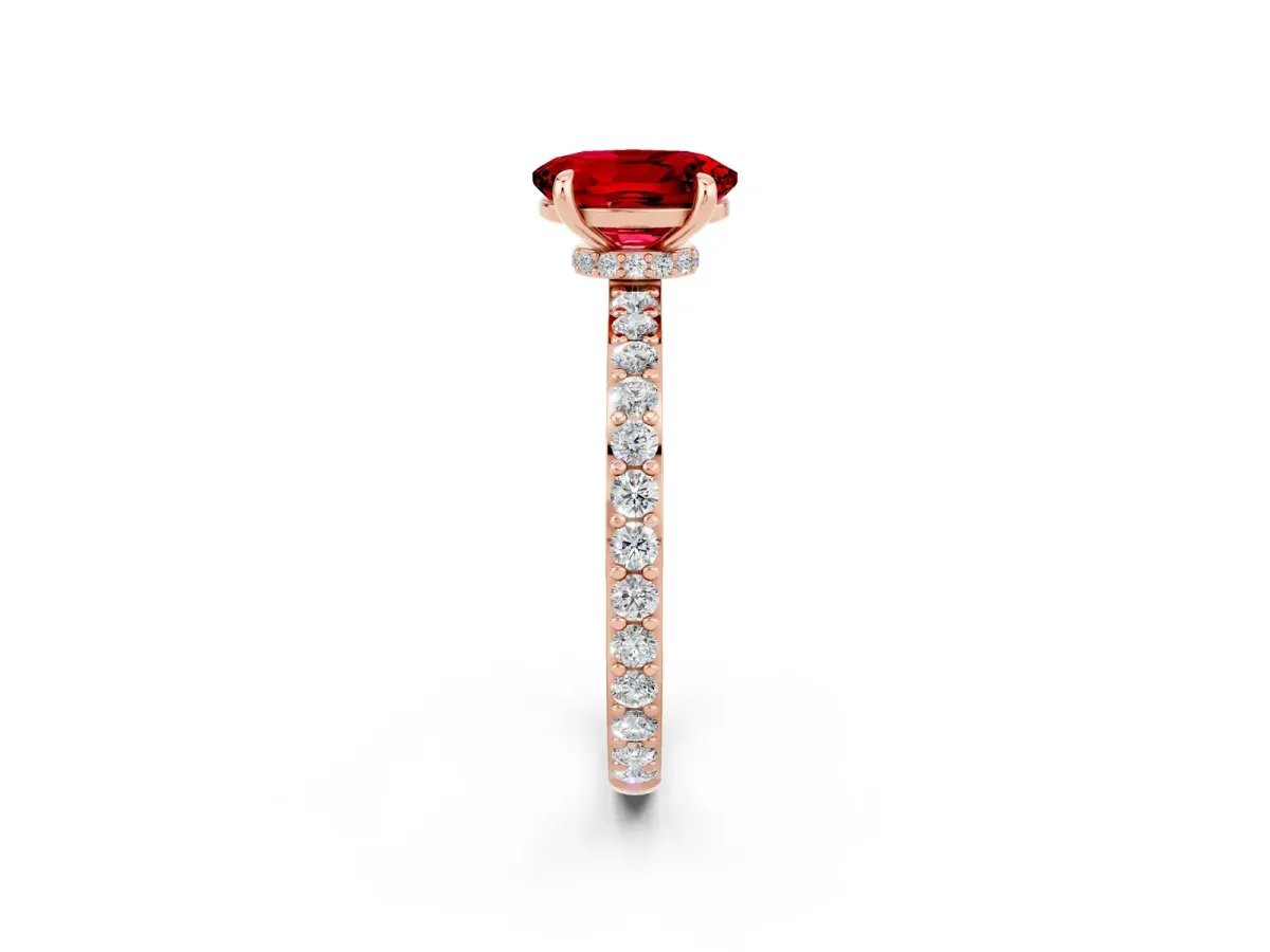 Oval Cut Ruby Solitaire Engagement Ring with Pavé Band and Four-Prong Setting Rose gold