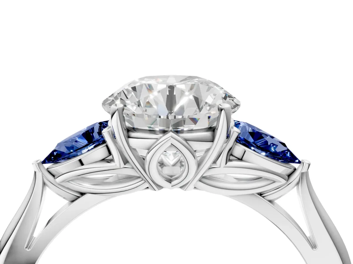 Round Cut Diamond Three-Stone Ring with Pear Blue Sapphire Side Stones and Prong Setting Silver